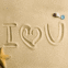 "I love U" dans le sable