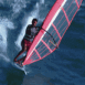 Planche � voilesur une vague