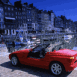 Cabriolet BMW rouge dans un port