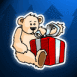 Nounours tenant un gros paquet-cadeau