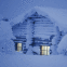 Chalet sous la neige